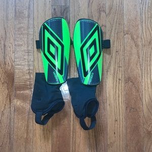 Umbro youth size medium shinguards.